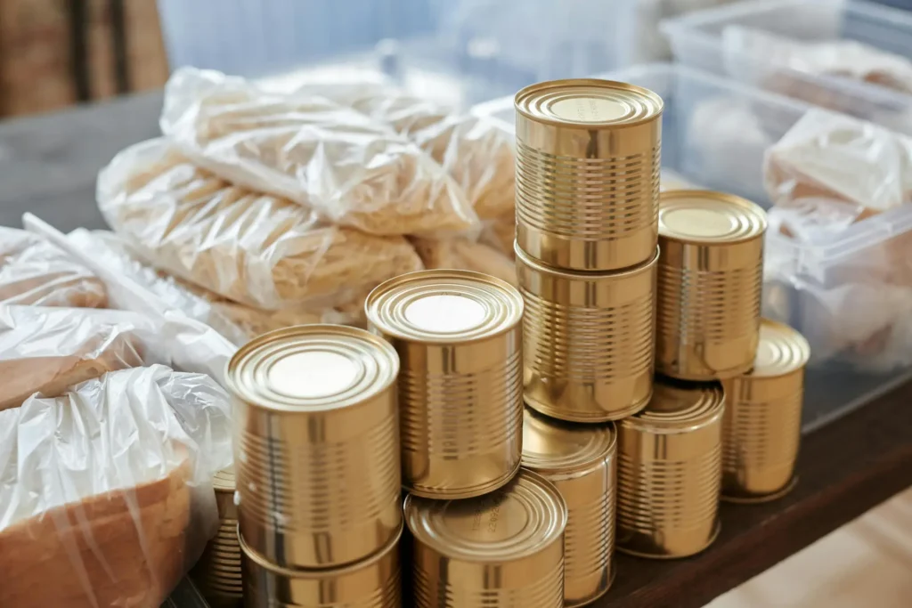 Non-perishable foods and canned foods are generally the simplest items to collect and distribute for a food drive. 