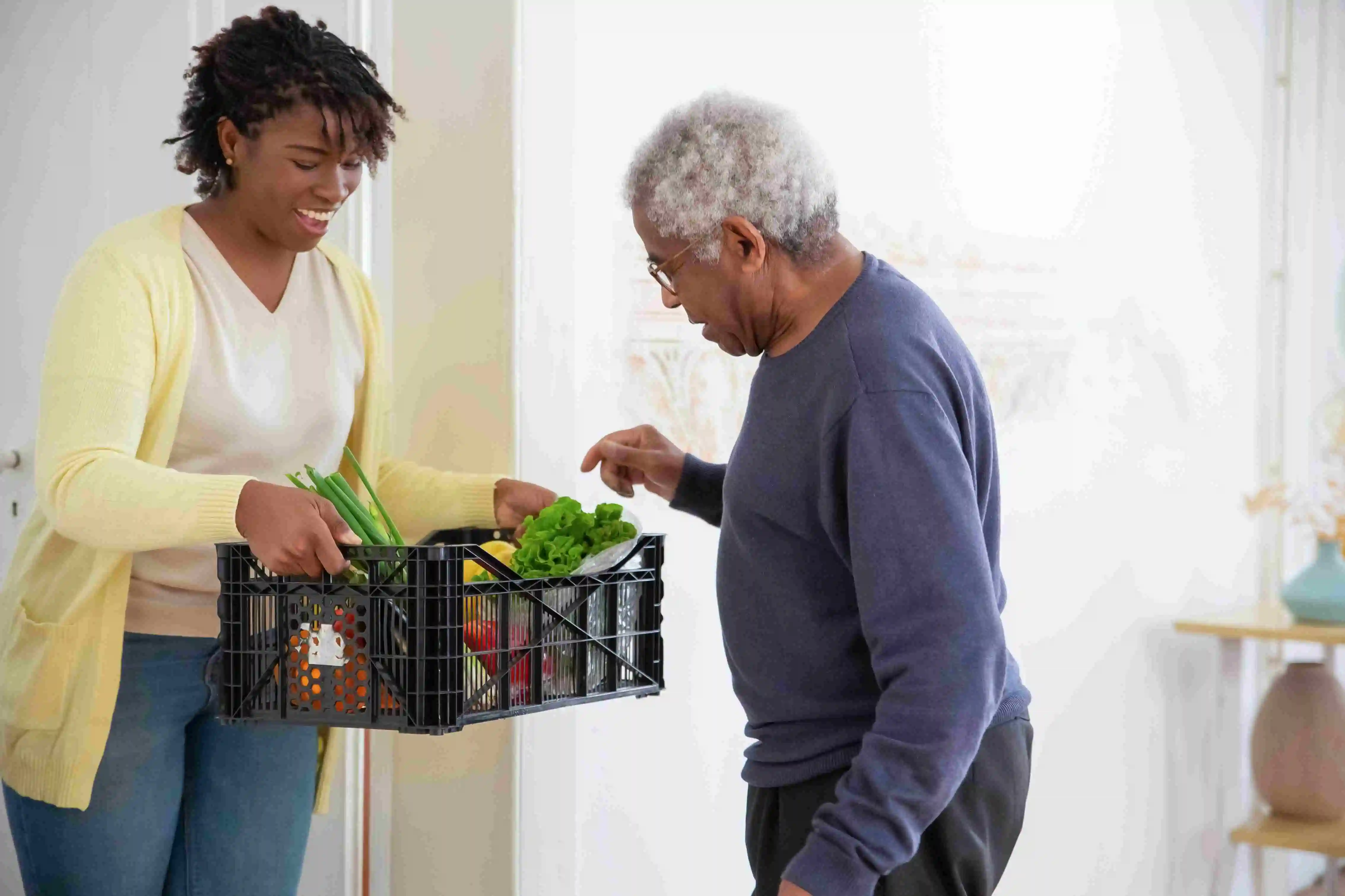 Charities can utilize corporate volunteers for a number of different food relief jobs, such as delivering fresh food boxes to vulnerable seniors. 