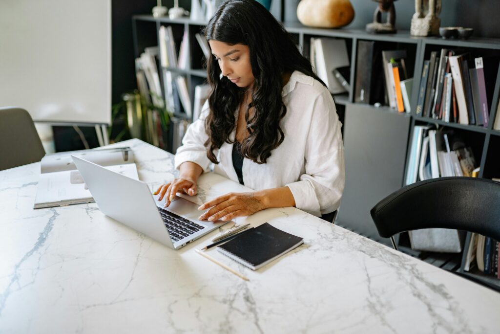 woman working on a laptop 